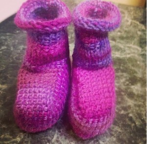 Gah!!! No amount of blocking will fix the fact that the poor baby stuck wearing these booties will look like she should be a mad professor's foot dragging assistant. 